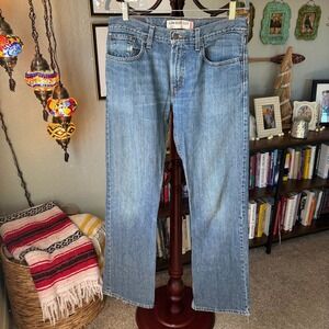Vintage Levi's 527 Low Bootcut Jeans • Light Wash • 90s/Y2K Denim • Men's 32x34